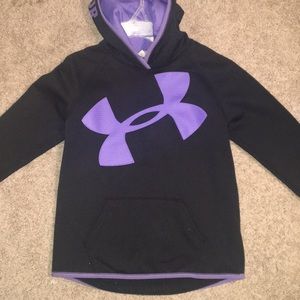 A purple and black under armour hoodie
